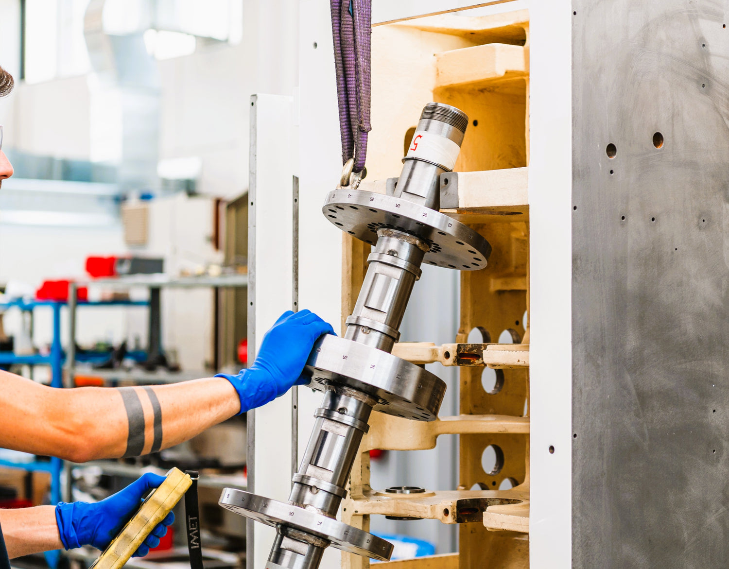 man adjusting multi-spindle machine